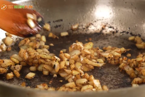 Step-03-In-the-same-pan-saute-onion-and-garlic-for-1-minute
